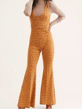 Free People Eyes On You Jumpsuit Size L Boho Flare Wide Leg Leopard Print Retro